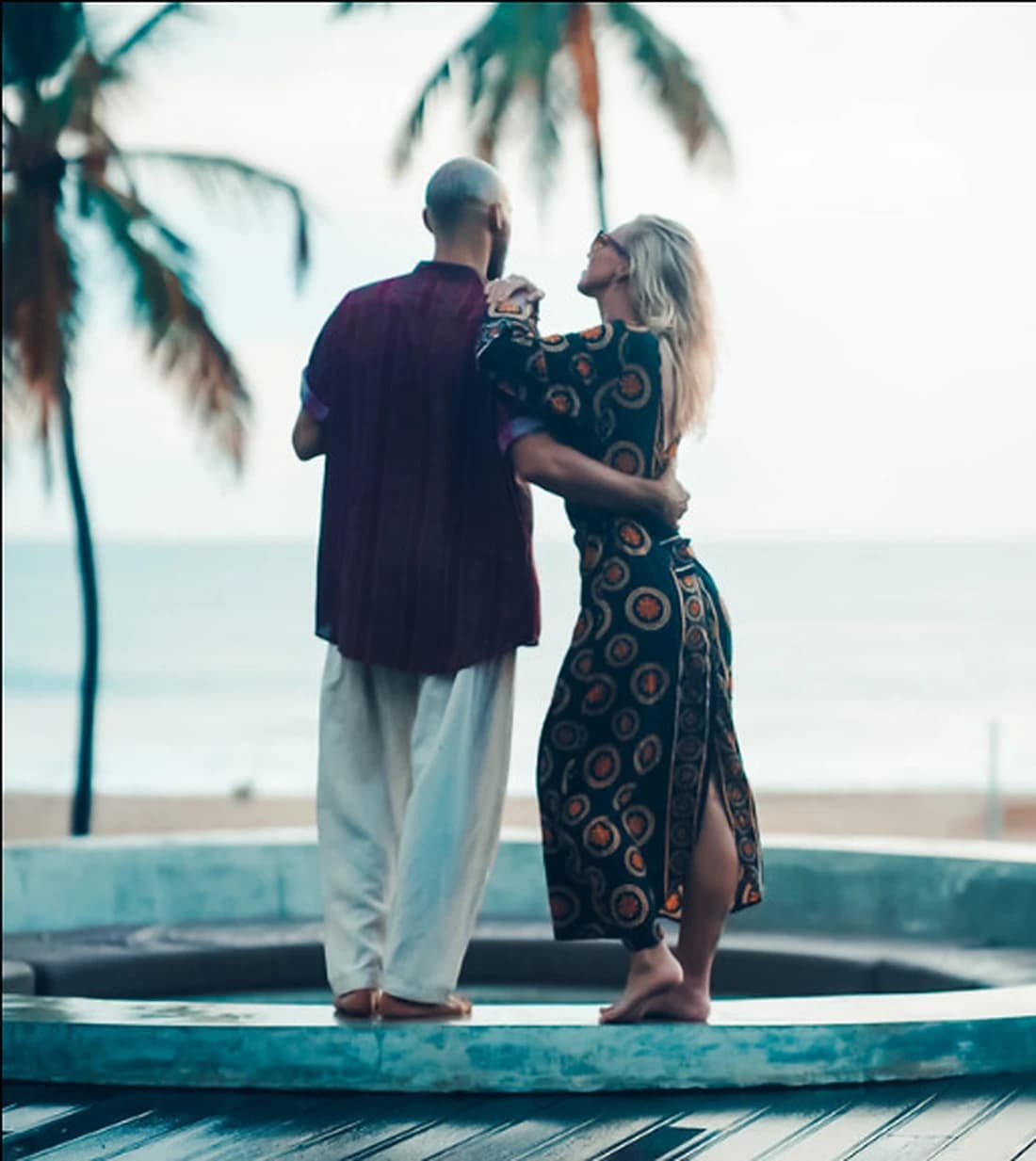 2CC — couple under the palms